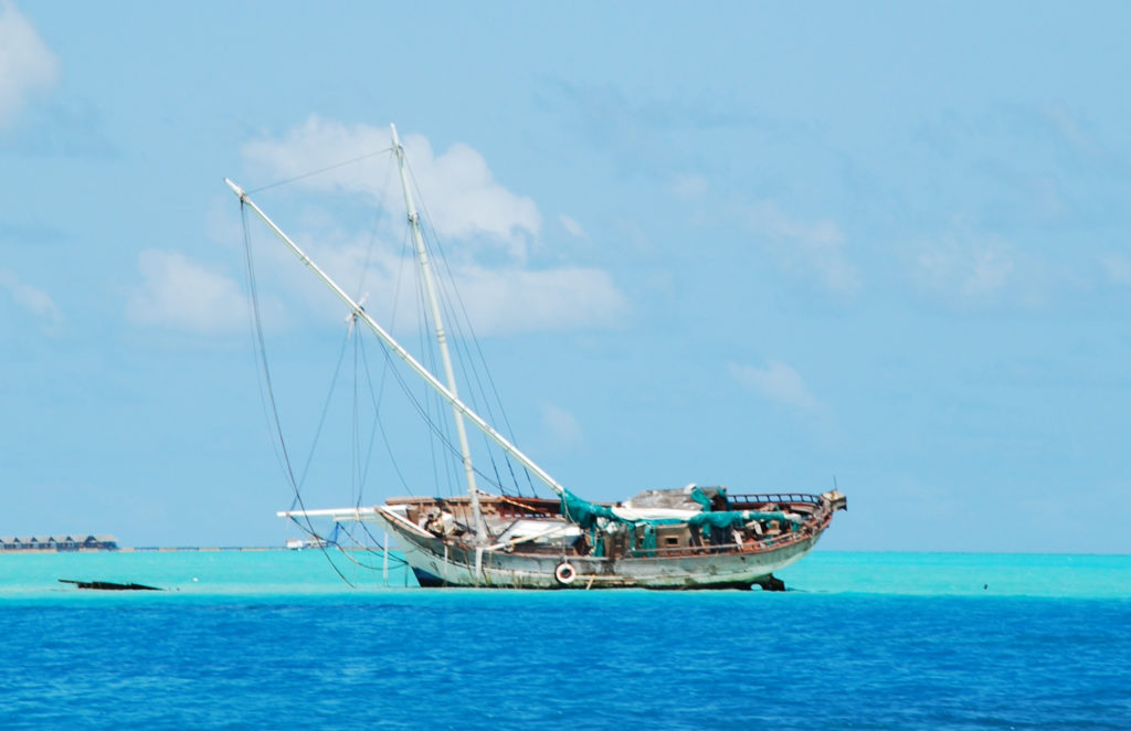 Semi-submerged typical ship on Maldives