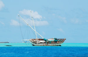 Semi-submerged typical ship on Maldives